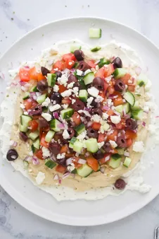 Mediterranean Appetizers: A 7-Layer Dip Recipe That Will Impress Your Guests